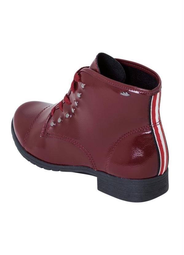 bota dakota tachas
