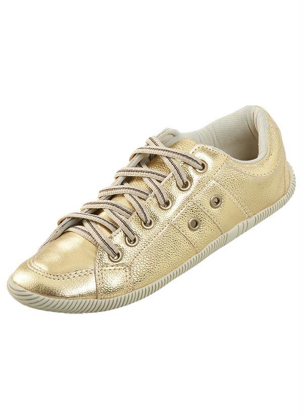 tenis com brilho dourado
